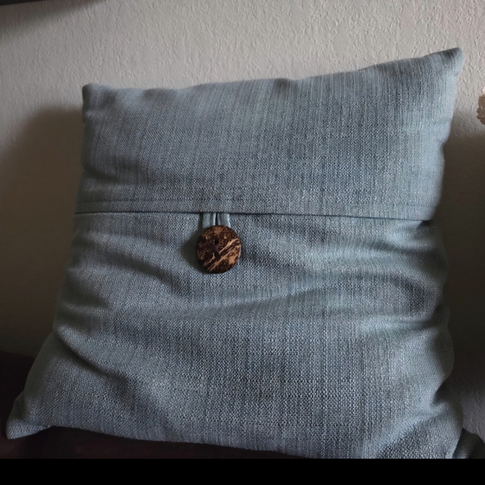 Blue Throw Pillow with Button Accent